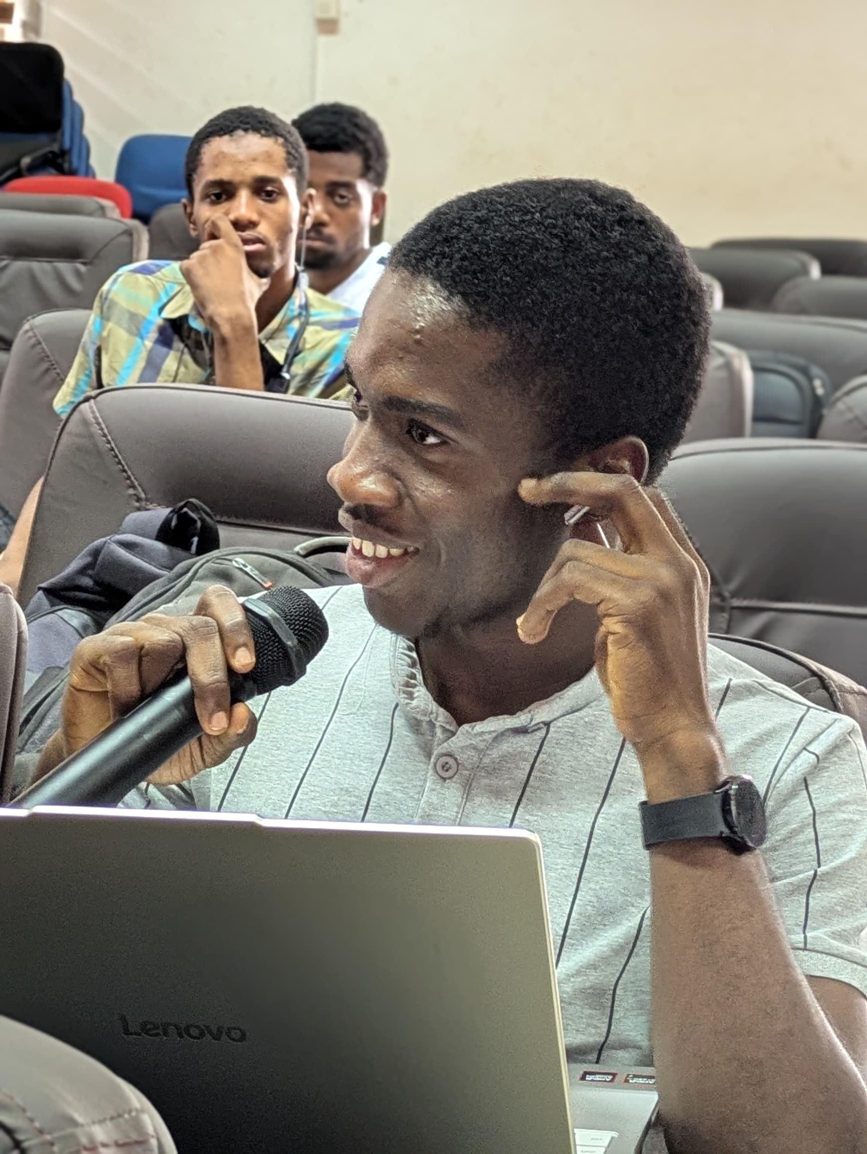 Benedict speaking at a KNUST event